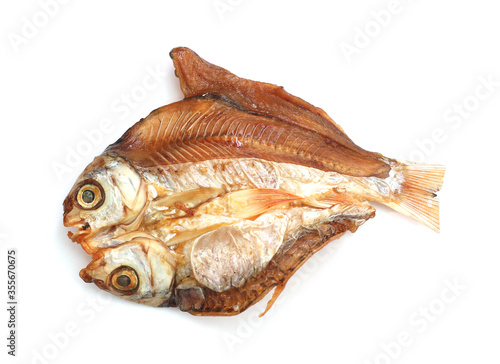 grilled dried fish on white background