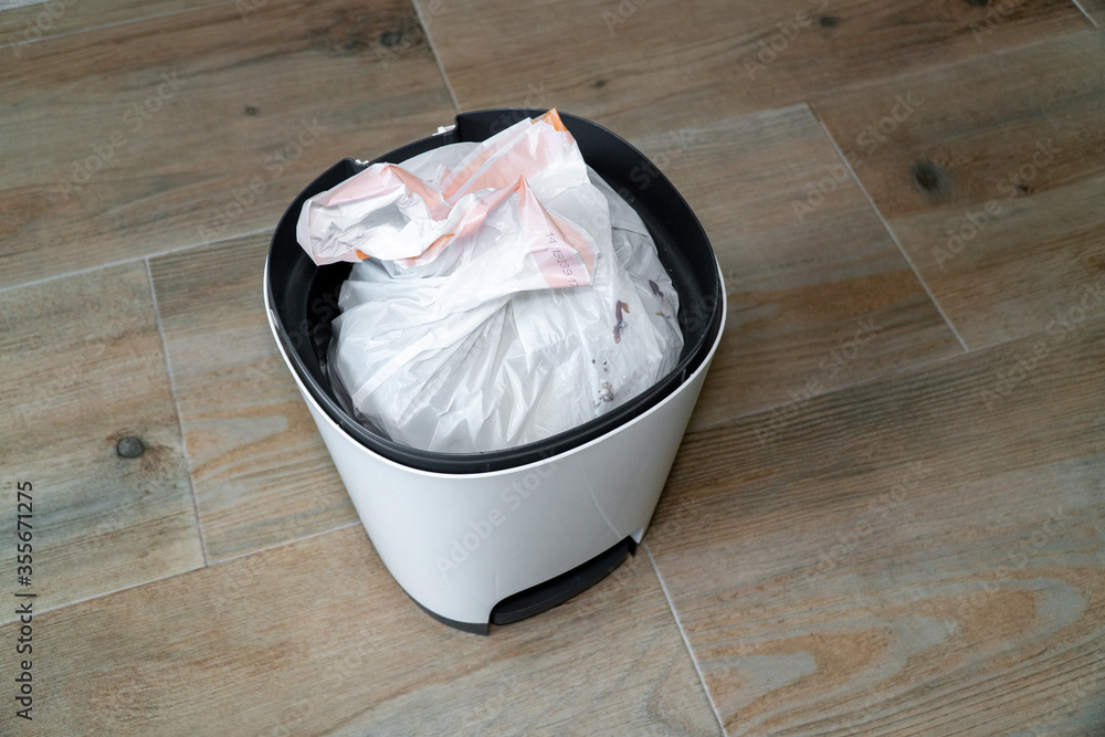 Top view of a bin with a plastic bag