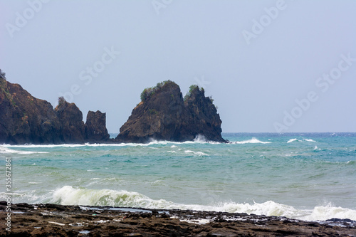 Waves from tropical storm Seniang - Jangmi pounding the coastline on Panay island in the Philippines