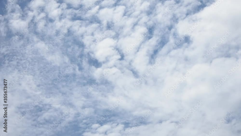 Time lapse motion the clouds are moving fast on the sky in the daytime bright. Time lapse motion the clouds are moving fast on the sky in the daytime bright.