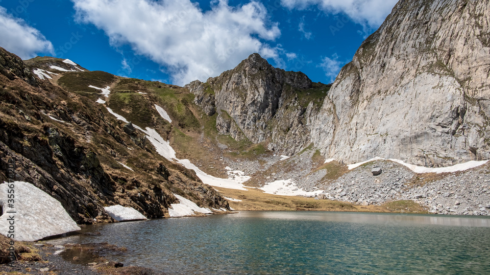 Trekking to the lake in the beautiful Carnic Alps, Friuli-Venezia Giulia, Italy Trekking to the lake in the beautiful Carnic Alps, Friuli-Venezia Giulia, Italy