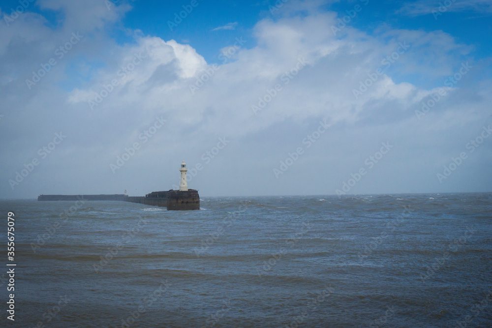 lighthouse on a breakwater 
