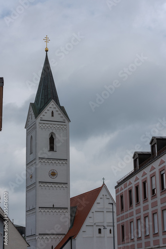 Leonhardi church on the river Amper in the bavarian town Fuerstenfeldbruck on cloudy overcast day photo