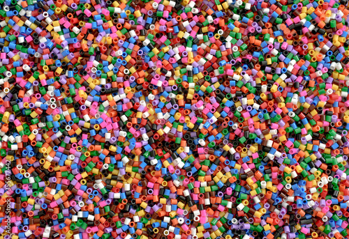 Abstract background of close up multi colored beads.