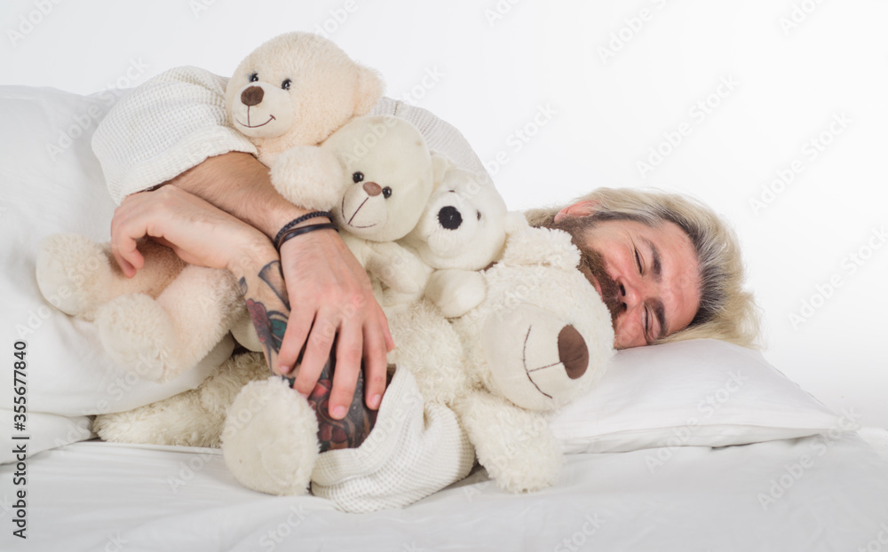 Teddy bear toy. Man sleep in bed. Bearded man in bed. Morning and wake up. Nap. Man sleeping with teddy bear. Teddy bear. Sleeping toy.