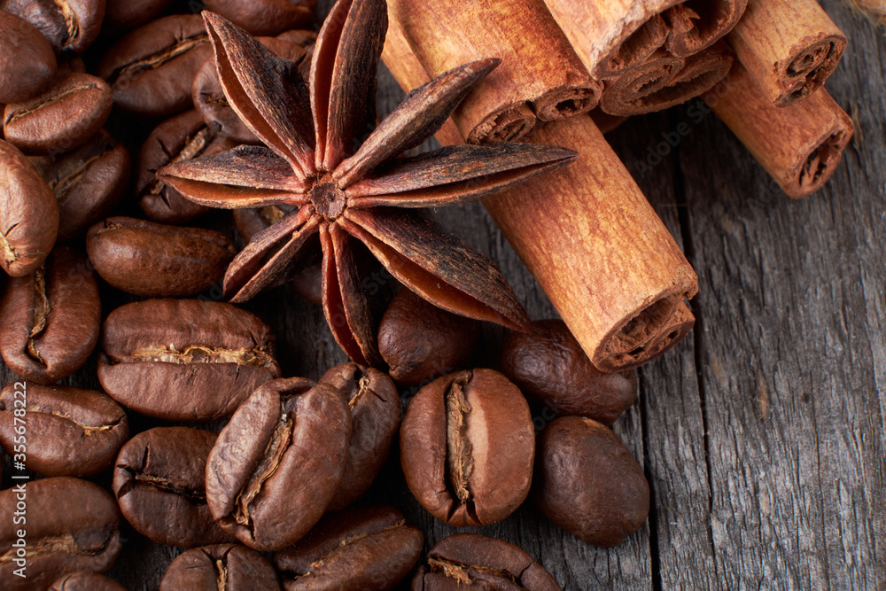 coffee beans close up on a wooden background coffee beans close up on a wooden background