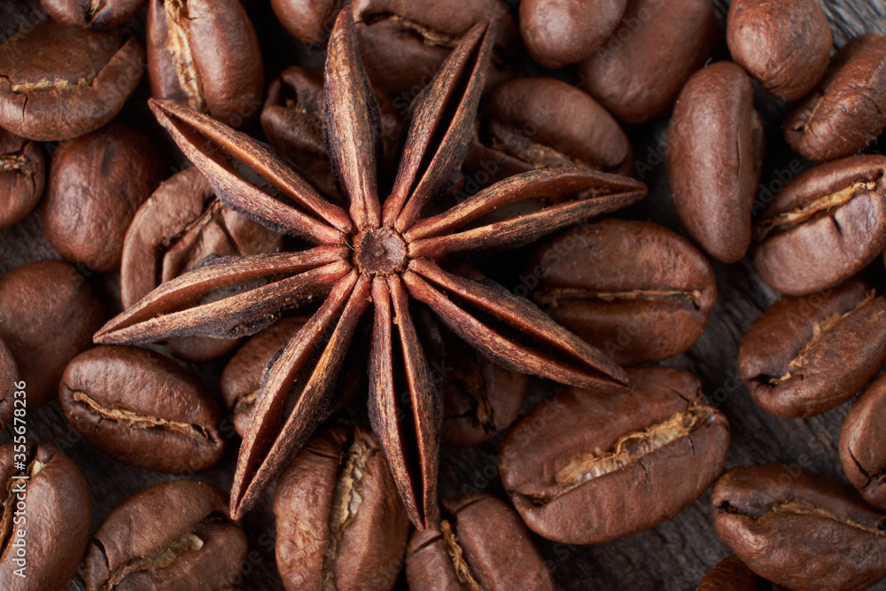 coffee beans close up on a wooden background coffee beans close up on a wooden background