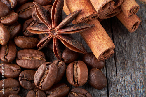Wallpaper Mural coffee beans close up on a wooden background Torontodigital.ca