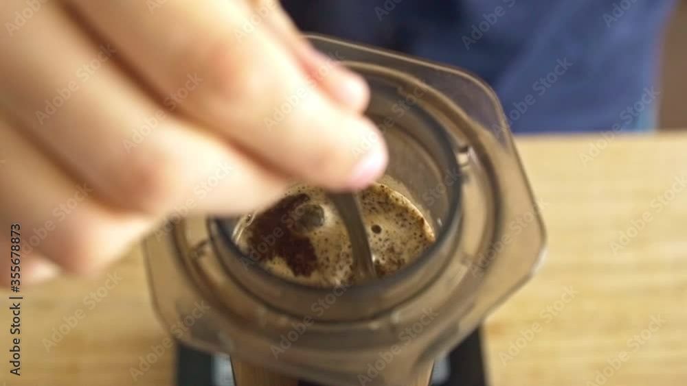 Manual Coffee brewing process - stirring coffee Manual Coffee brewing process - stirring coffee