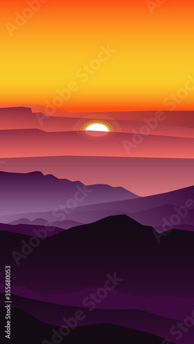 A picture of mountains against the setting sun