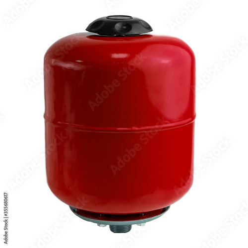 Red expansion tank for heating system. Isolated on white background.