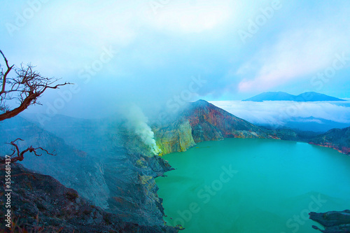 Panoramic view of Kawah Ijen Volcano at Sunrise. The Ijen volcano complex is a group of stratovolcanoes in the Banyuwangi Regency of East Java, Indonesia