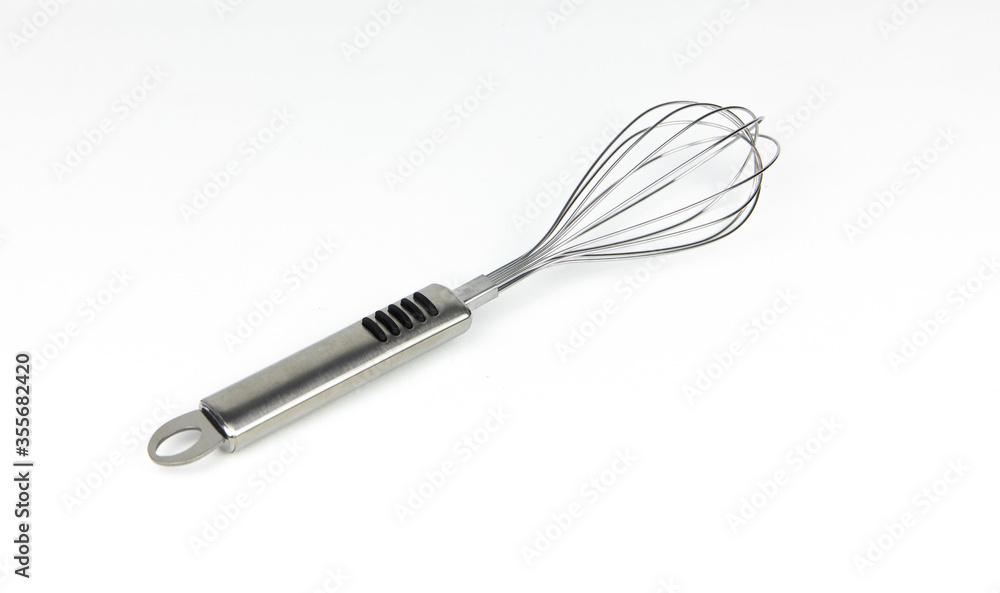 Metal wire steel whisk isolated on white Metal wire steel whisk isolated on white