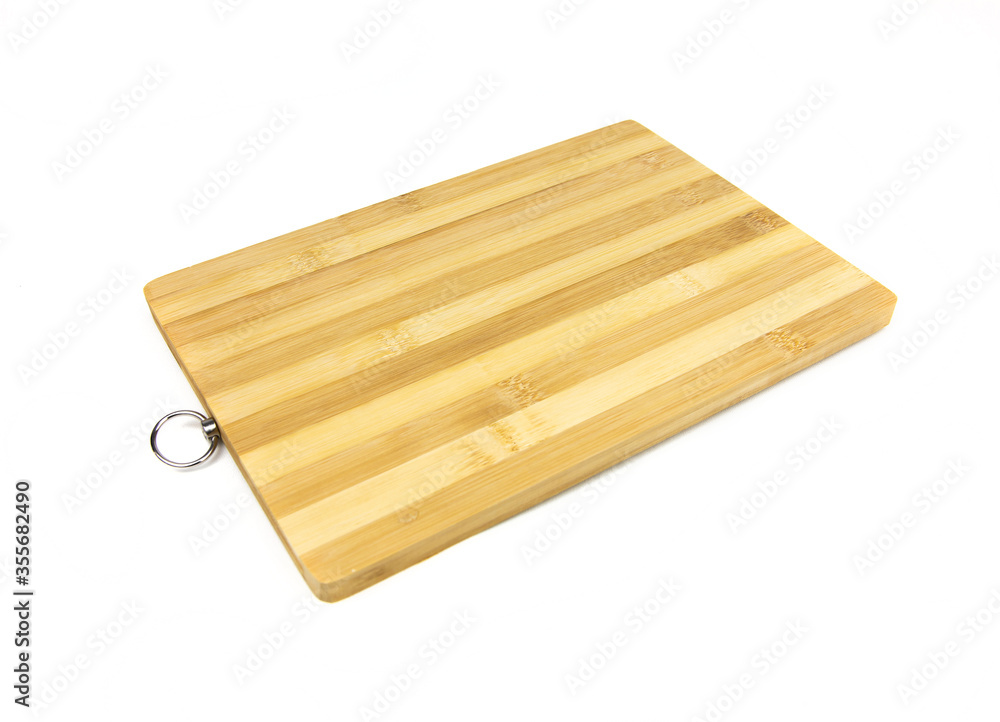 Wooden cutting board isolated on white background. Bamboo Kitchen utensils. Wooden cutting board isolated on white background. Bamboo Kitchen utensils.