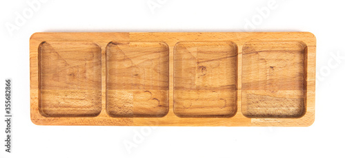 Wooden plate isolated on white background. Bamboo Kitchen utensils.