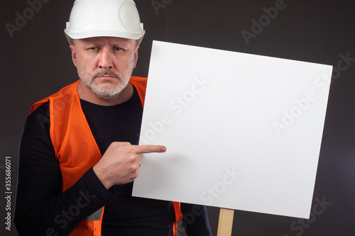 Builder points a finger at ...