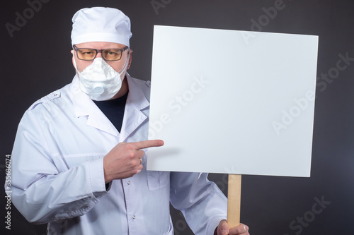 Medic shows a poster. Medic...