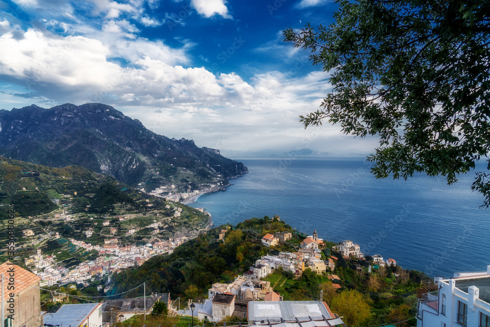 Landscape of the Amalfi coast in a sunny day with beautiful cloudy sky. View from the terrace of Ravello