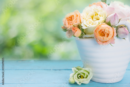 Garden  roses on wooden board .Template for design,greeting cards