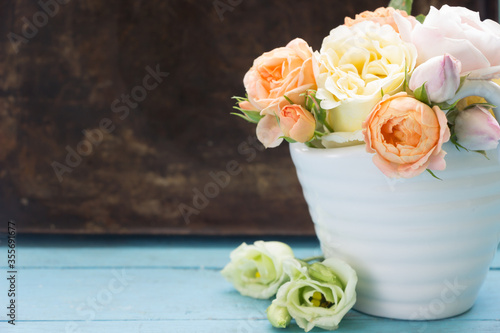 Rose flowers composition.Template design, rustic dark background.  Vintage floral card.