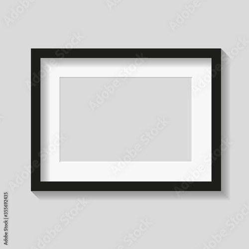 Black photo or picture frame with white mat and shades isolated on gray background. Vector illustration. Wall decor. Rectangle horizontal photo frame