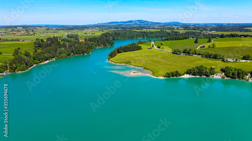 Aerial view over Lake Forggensee at the city of Fuessen in Bavaria Germany