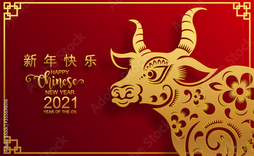 Chinese new year 2021 year of the ox , red paper cut ox character,flower and asian elements with craft style on background.(Chinese translation : Happy chinese new year 2021, year of ox)