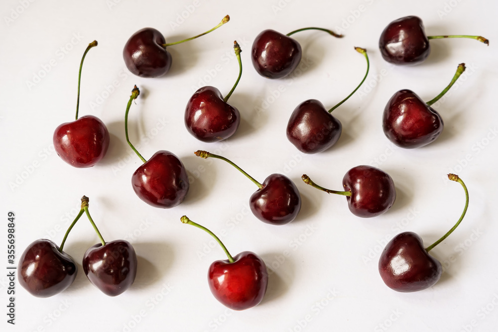 Ripe red cherries layout with copy space Ripe red cherries layout with copy space