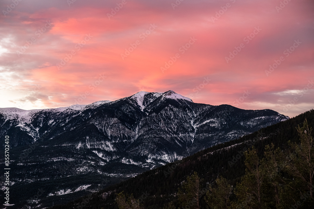 Snowy covered Spanish,  Catalan mountain range Serra Mata-Rodona with a rose pink sunrise. Seen from Pedraforca, Saldes