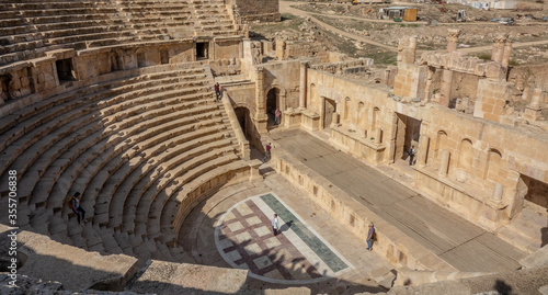 Jerash Jordan-november 18 2018: tourists wander through the monumatal remains of the roman era in Jerash photo