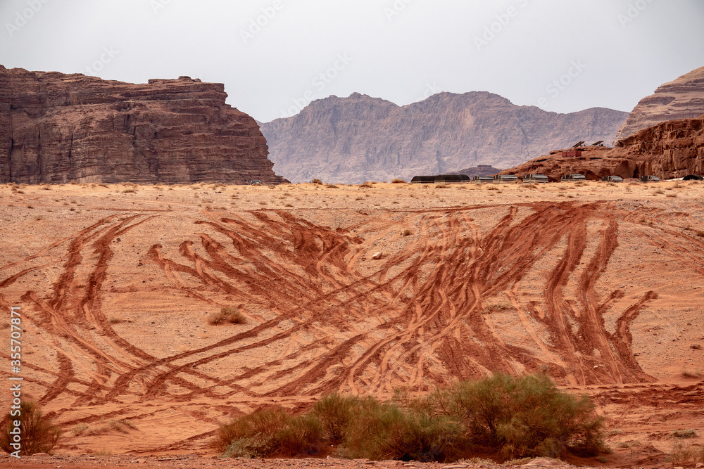 Red sand and rocks in the Wadi Rum desert in Jordan. Red sand and rocks in the Wadi Rum desert in Jordan.