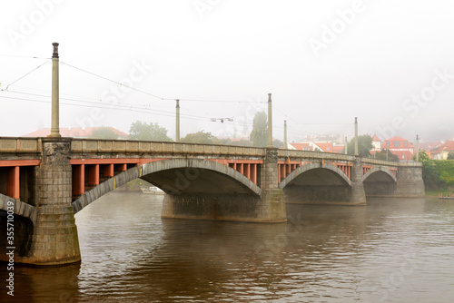 Manes Bridge in fog, Prague, Czech Republic