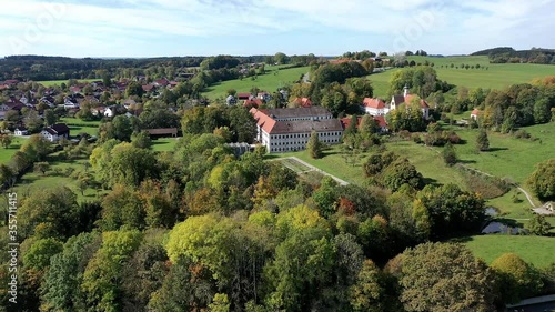 Aerial view, flight at monastery Polling with the parish church of St. Salvator and Heilig Kreuz, former Augustinian canons collegiate church, Upper Bavaria, Bavaria, Germany photo