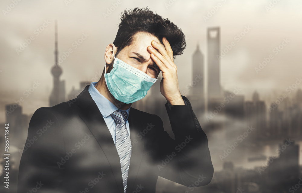 Man choking due to the smog in a polluted city and wearing a mask