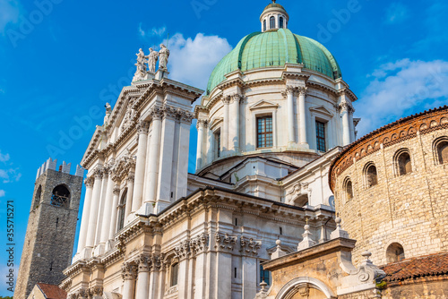 Cathedral of Santa Maria Assunta viewed behind Duomo Vecchio in Brescia, Italy photo