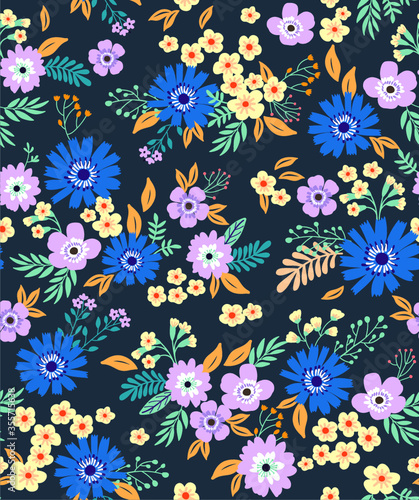 Floral pattern. Pretty flowers on dark gray background. Printing with small-scale blue and lilac flowers. Ditsy print. Seamless vector texture. Spring bouquet