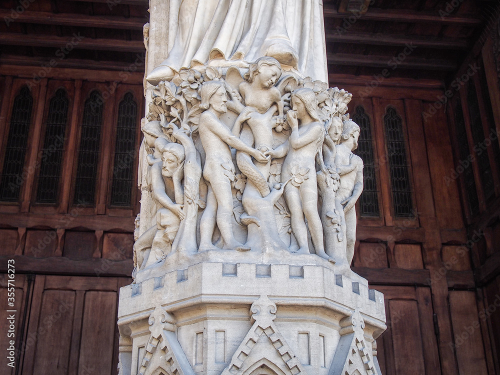 Adam and Eve statues on the western faсade of the Notre-Dame de Paris.