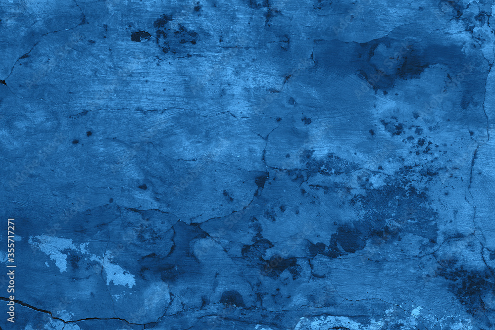 Classic deep blue old rustic wall in cracks
