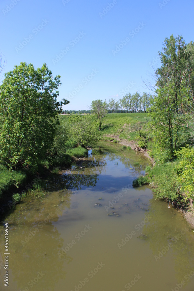 Little river with reflection in water