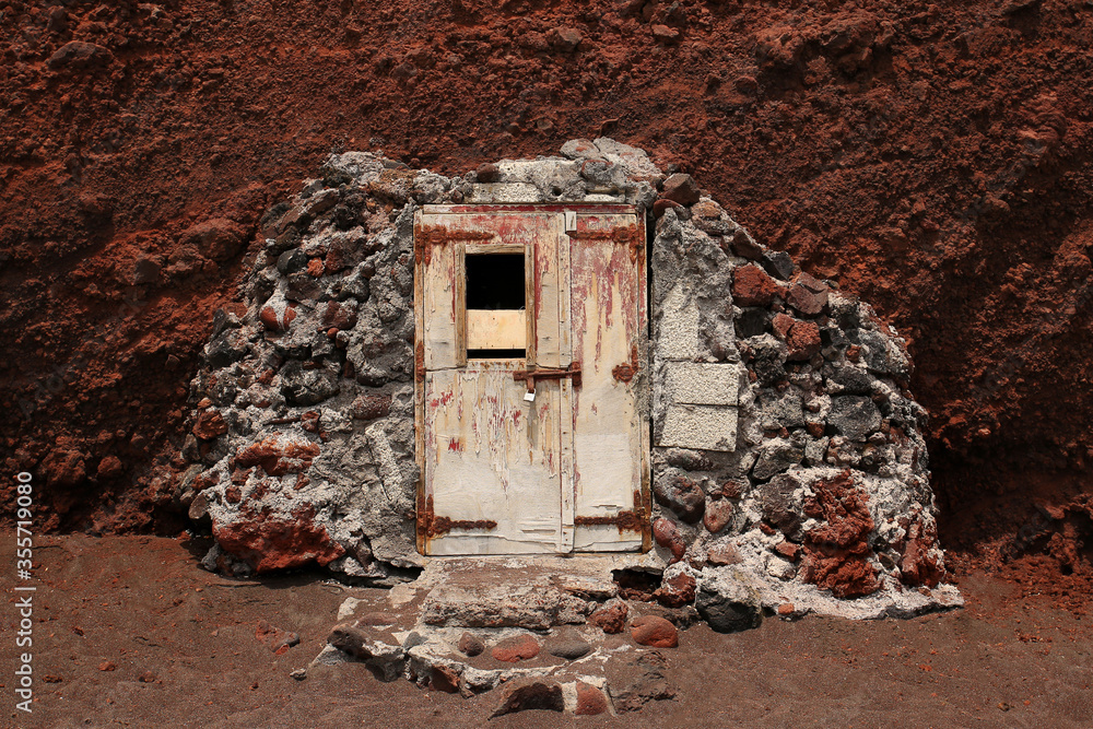 Door at the cliff of Red Beach, Santorini, Greece. Door at the cliff of Red Beach, Santorini, Greece.