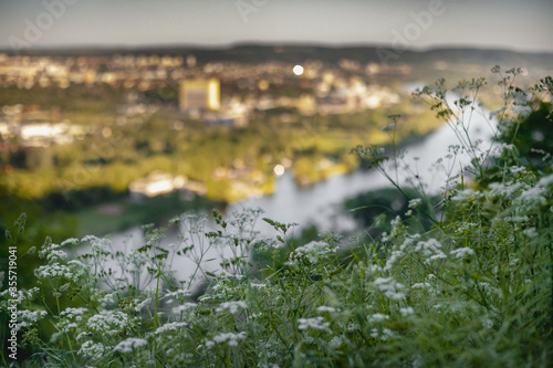 Photography Scenic view of Prague periphery, urban area and river Vltava, moody evening sunl