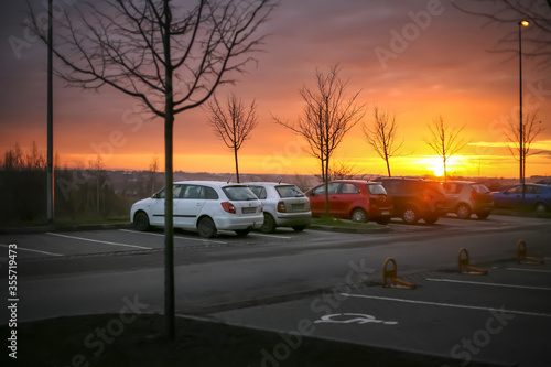 Photography cars parked in small parking lot, disabled parking for handicapped or disabled c