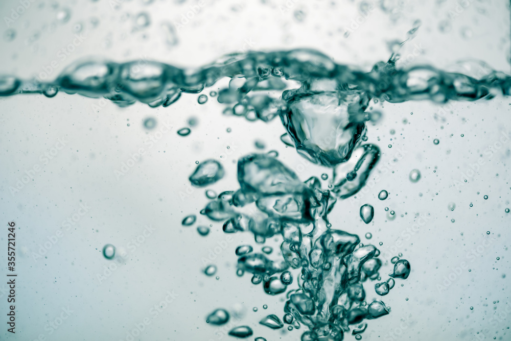 Background of pure water is pouring with bubbles. Background of pure water is pouring with bubbles.