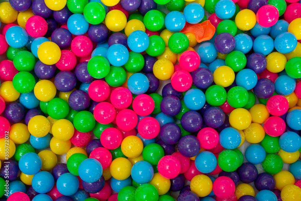 Multi color vibrant plastic ball in kids playing station. Multi color vibrant plastic ball in kids playing station.