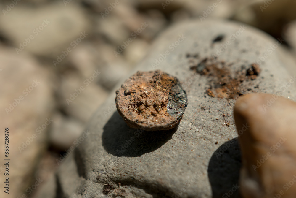 Rusty metal on a stone Rusty metal on a stone