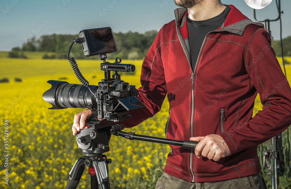 Videographer Operator with Professional Digital Camera