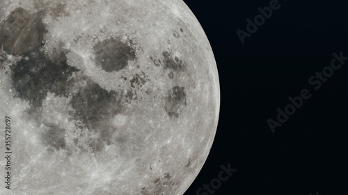 Moon white on left side with black background