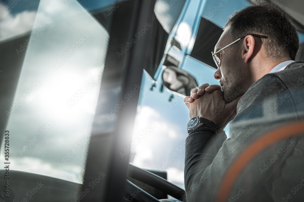 Pensive Bus Coach Driver Behind Vehicle Wheel Pensive Bus Coach Driver Behind Vehicle Wheel