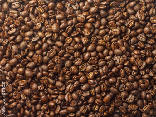 Top view  roasted coffee beans  brown  suitable for background images.