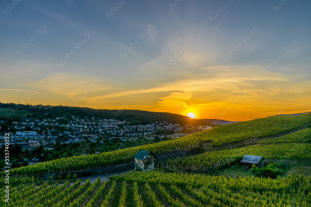 Breathtaking fire pastel sunset over the vineyards of Moselle river valley in Germany in Bernkastel-Kues 